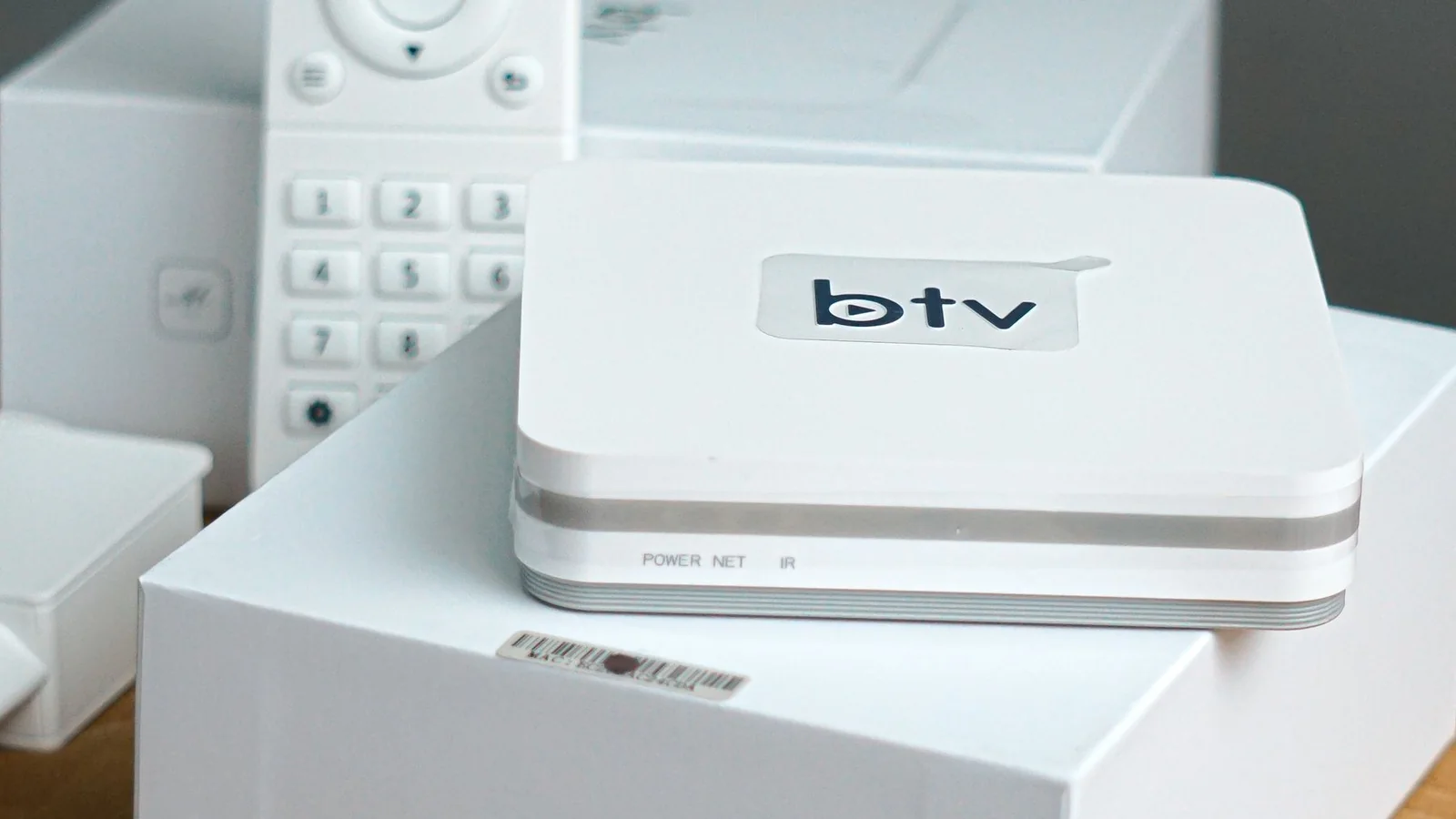 Modern smart TV remote and streaming equipment ready for installation