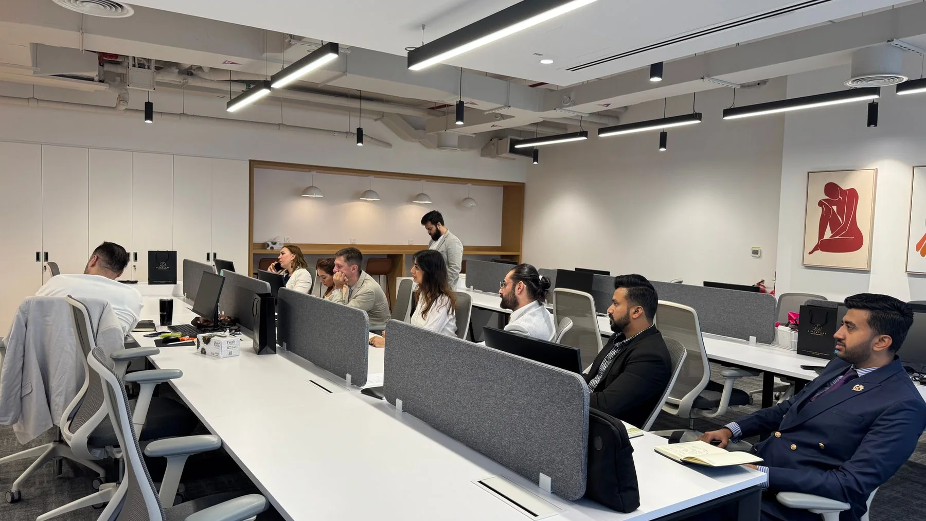 Modern ViewX reseller team collaborating in a connected workspace